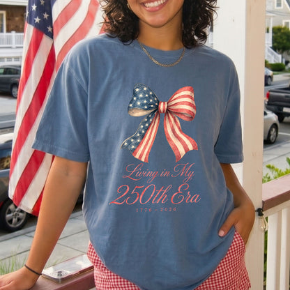Living in my 250th ERA Coquette Bow, America Semiquincentennial Comfort Colors Shirt