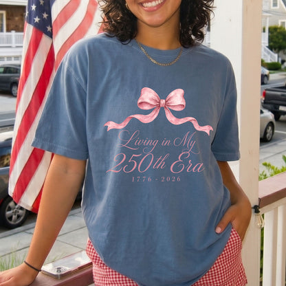 Living in my 250th ERA Pink Bow, America Semiquincentennial Comfort Colors Shirt