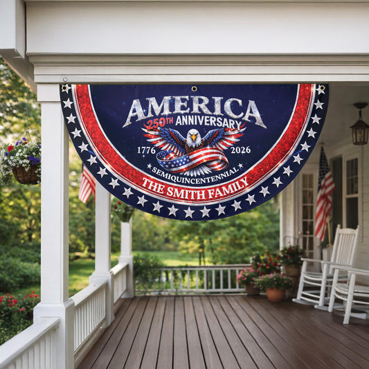 Decorative banner celebrating America's 250th anniversary on a porch with American flags and plants.