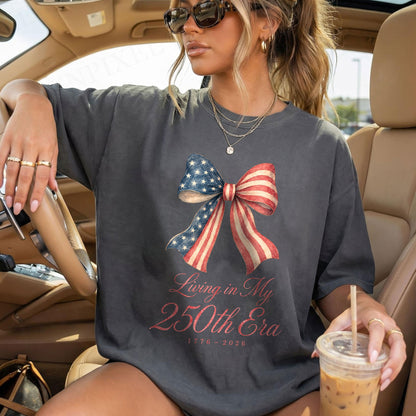 Living in my 250th ERA Coquette Bow, America Semiquincentennial Comfort Colors Shirt
